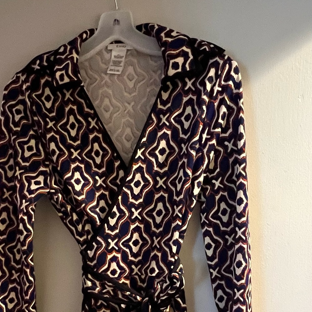 Esley vintage long sleeved wrap dress in red and blue pattern.